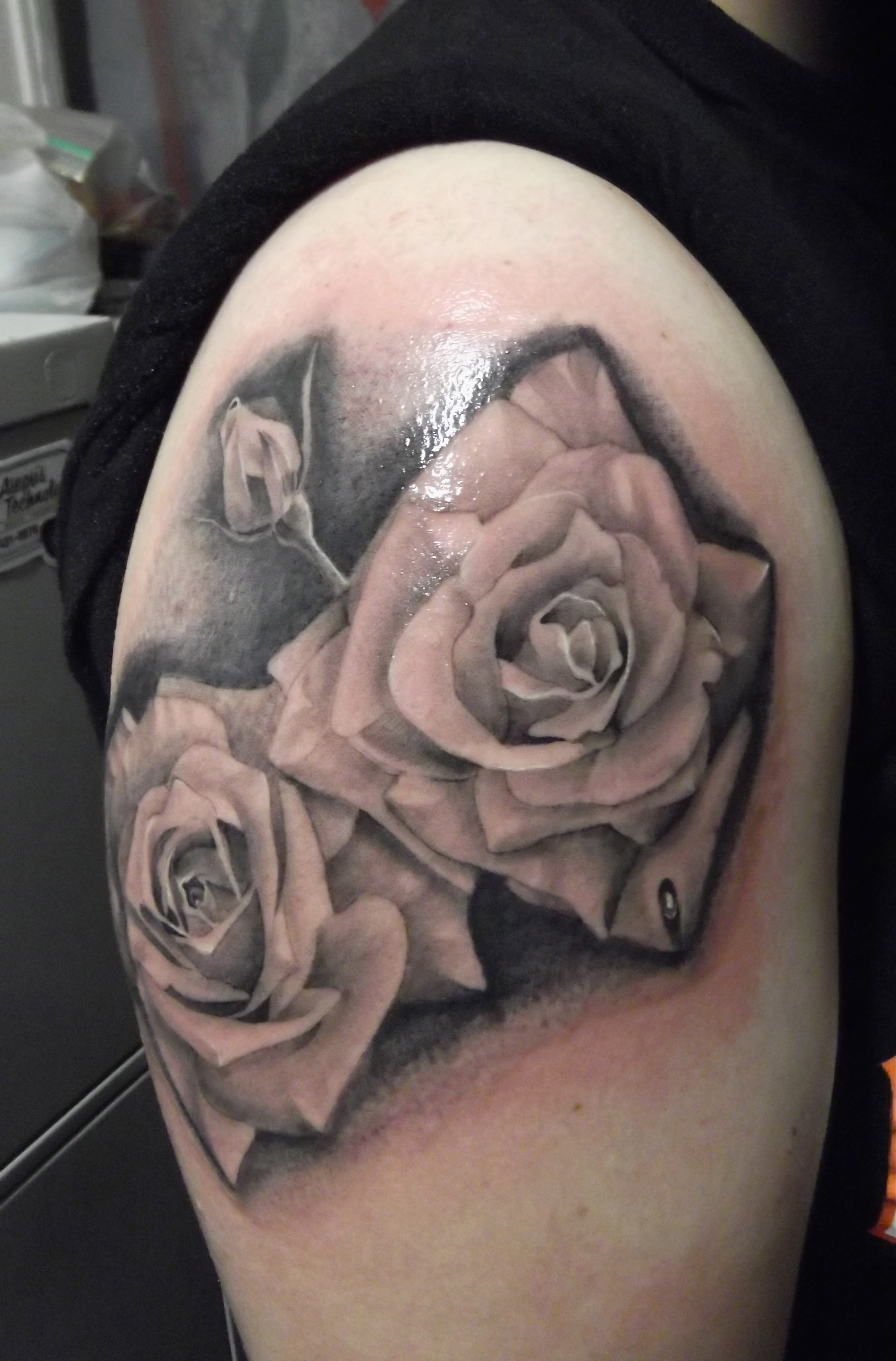 water drop on rose tattoo
